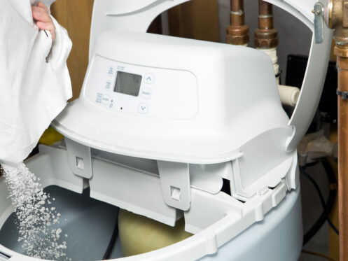 Adding salt to the water softener